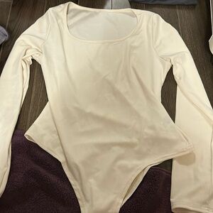 Cream body suit
